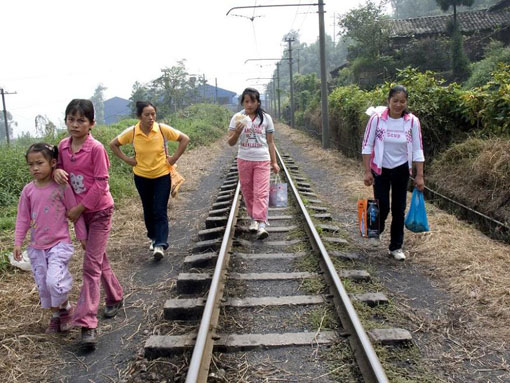 Walking on the Rail �C This can save the three Yuan (about 0.4 USD) train ticket. 